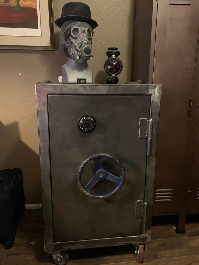 Vintage-style steel safe cabinet on casters