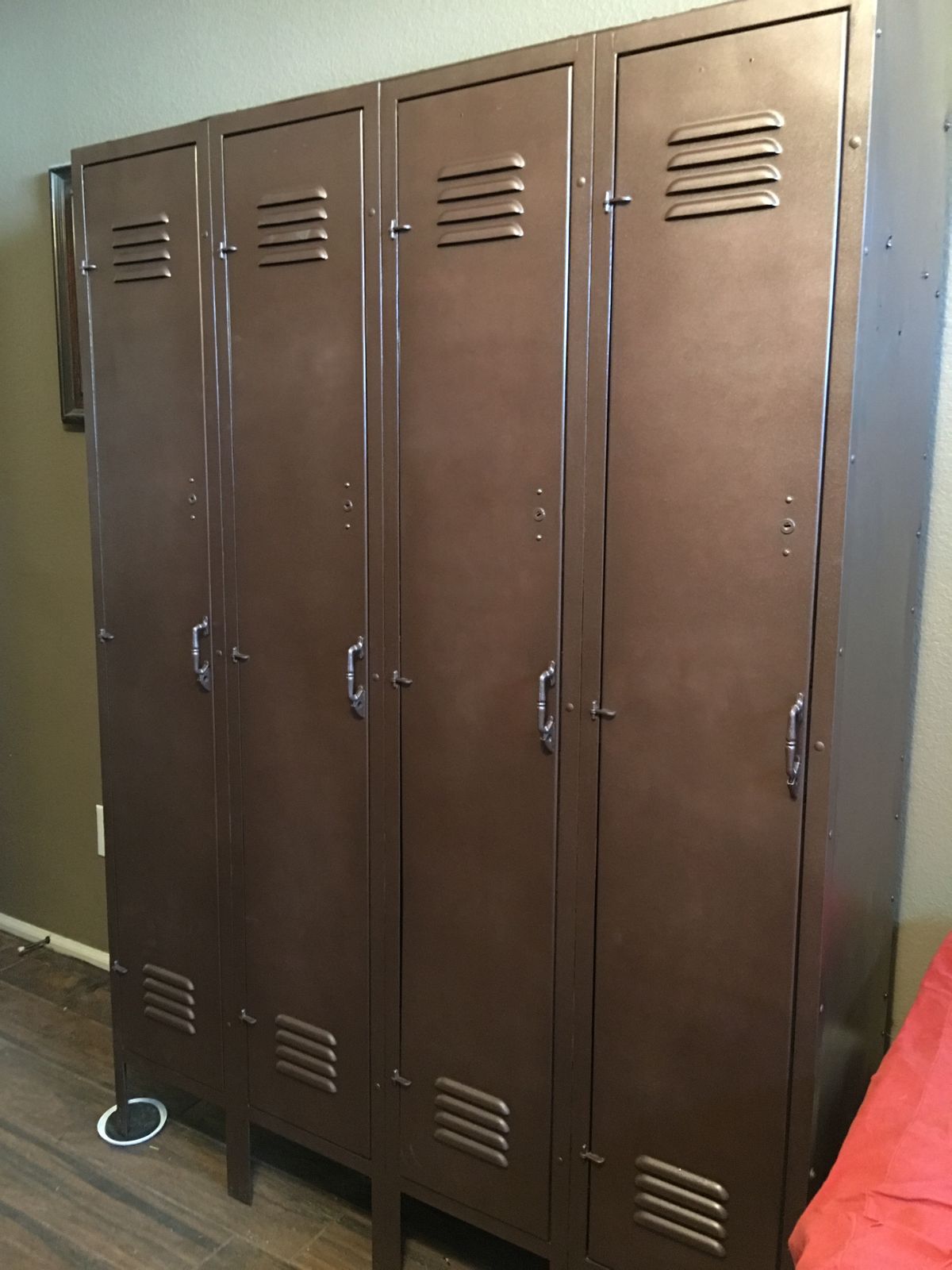 Row of bronze-finished steel locker cabinets